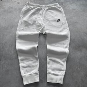 White nike joggers with black